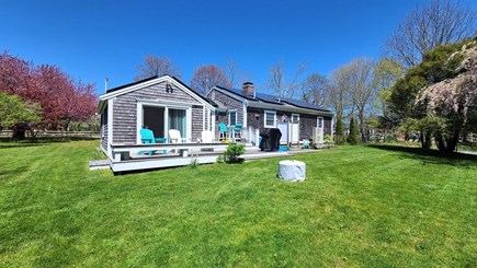 Eastham Cape Cod vacation rental - Lovely backyard with deck, fire pit, gas grill and outdoor shower