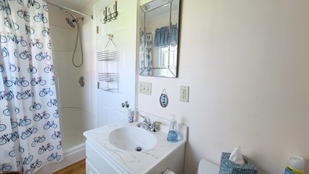 Eastham Cape Cod vacation rental - Bathroom off hall to family room with shower