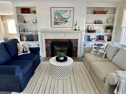 West Dennis Cape Cod vacation rental - Comfortable living room for reading by the gas fireplace.