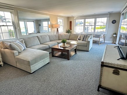 West Dennis Cape Cod vacation rental - Large sectional and smart tv with streaming in family room.