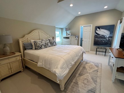 West Dennis Cape Cod vacation rental - Primary bedroom with king size bed and private full bath.