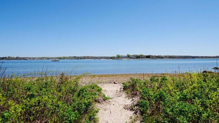 Bourne, Mashnee Island Cape Cod vacation rental - Steps down a path to your backyard beach