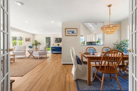 Bourne, Mashnee Island Cape Cod vacation rental - Open living/dining/kitchen area closed off with French doors