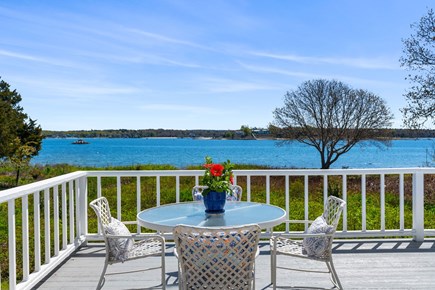 Bourne, Mashnee Island Cape Cod vacation rental - Al fresco dining - larger table &  loungers will be there