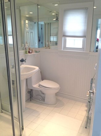 East Sandwich Cape Cod vacation rental - White tile, bead board, European shower and mirrors all around