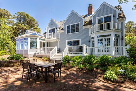 South Dennis Cape Cod vacation rental - Shady back patio with water views