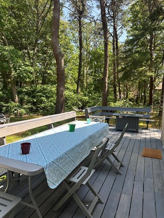 Falmouth Cape Cod vacation rental - Large deck with dining table and firepit table
