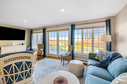 Sandwich Cape Cod vacation rental - Cozy living room with access to the back deck