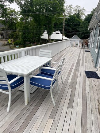 Falmouth Cape Cod vacation rental - 2nd floor patio w/ outdoor dining - great for viewing sunsets