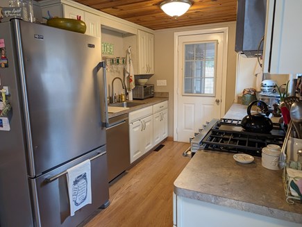 Marstons Mills Cape Cod vacation rental - Fridge has freezer under, dishwasher, gas stove, microwave above