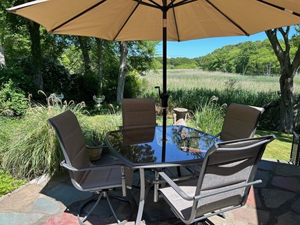 Hyannisport Cape Cod vacation rental - Patio table overlooking marsh. Perfect for any meal!