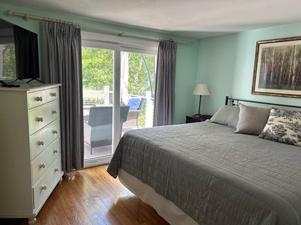 Hyannisport Cape Cod vacation rental - Bedroom#1 with king bed and sliding door to elevated deck