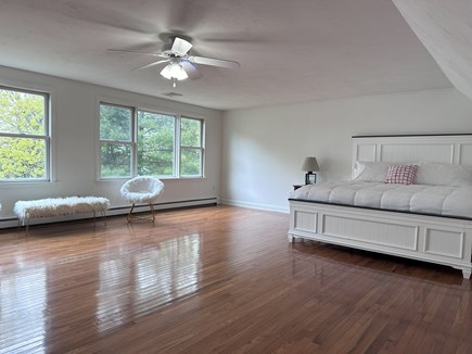 Bourne, Buzzards Bay  Cape Cod vacation rental - Large 4th bedroom with TV, sitting area, and leather futon.