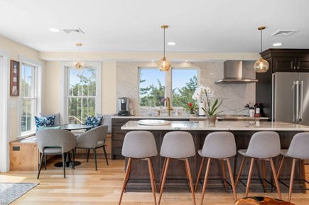 Chatham Cape Cod vacation rental - Inviting dining nook and convenient breakfast bar with seating for up to five guests