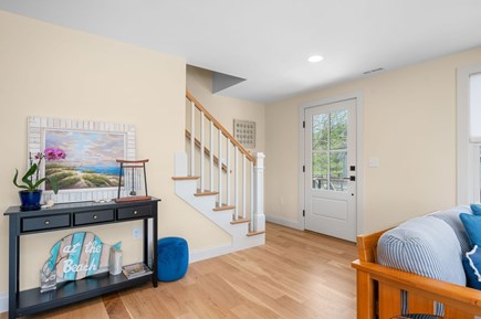 Chatham Cape Cod vacation rental - Staircase to the upper level located just off the living area
