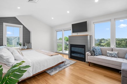 Chatham Cape Cod vacation rental - Bedroom #3 - Spacious Upper-Level King Retreat Featuring a Gas Fireplace