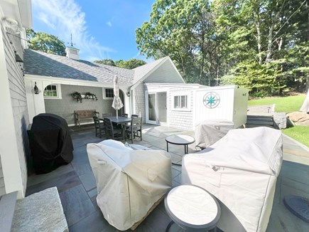 Centerville,  Mid Cape/ Barnestable Cape Cod vacation rental - Back Patio W/ Grill and Covered Couches/Chairs & Outdoor Shower!