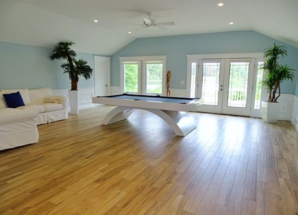 Harwich Cape Cod vacation rental - French doors in living room lead to billiard room with pond views