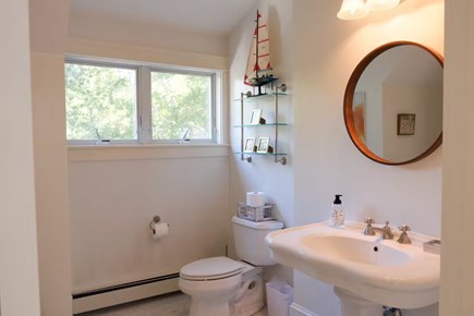 Cotuit, Barnstable Cape Cod vacation rental - Stylish half bath with modern finishes and functional design.