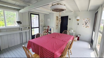 Wellfleet Cape Cod vacation rental - Screened in porch accessing back door to home and bunkie