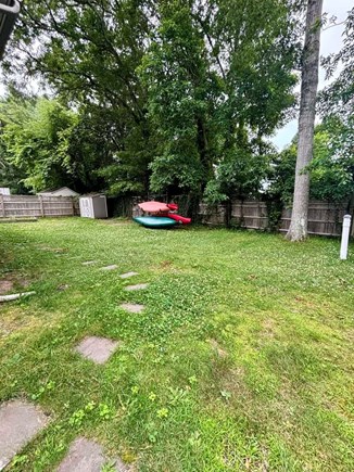 Mashpee, New Seabury Cape Cod vacation rental - Backyard with kayaks available to bring to nearby (walkable) bay