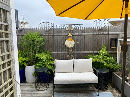 Provincetown Cape Cod vacation rental - Love seat leading to grilling space