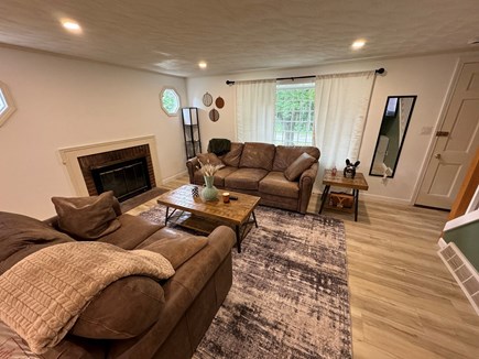 East Falmouth Cape Cod vacation rental - Living room with fireplace.