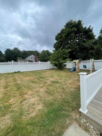 East Falmouth Cape Cod vacation rental - Two swings + baby swing! Fenced in yard