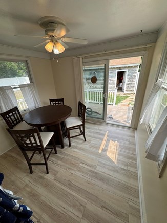 East Falmouth Cape Cod vacation rental - Breakfast nook facing backyard.