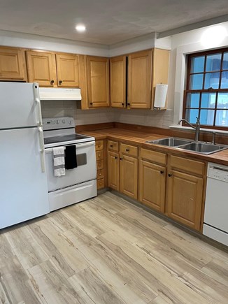 East Falmouth Cape Cod vacation rental - Working appliances + new butcher block counter tops.