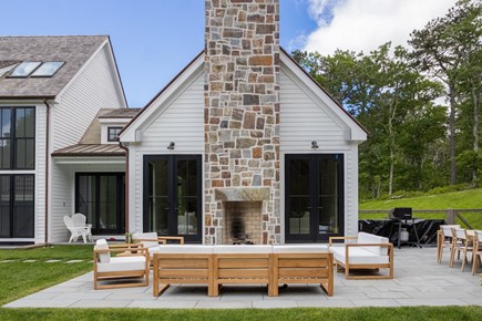 Harwich Cape Cod vacation rental - Outdoor patio and fireplace