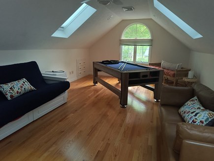 Barnstable, Marstons Mills Cape Cod vacation rental - Loft area with a couch and futon, TV and a 3-way game table