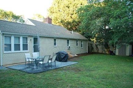 Centerville Cape Cod vacation rental - Rear of house with patio