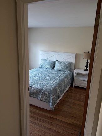 West Yarmouth Cape Cod vacation rental - Primary Bedroom with a Queen Bed and 1/2 bathroom.