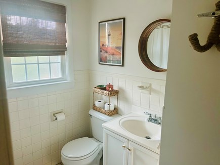 Harwich Cape Cod vacation rental - Full bathroom with shower, tub, shelves with storage and towels