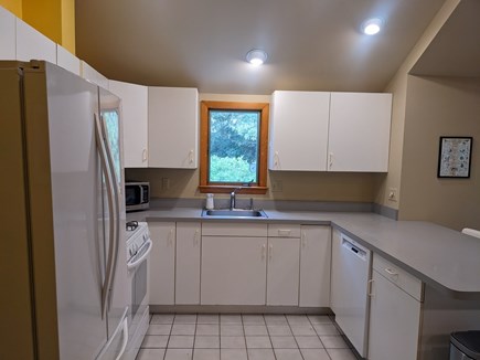 Wellfleet Cape Cod vacation rental - Kitchen opens up to main room.