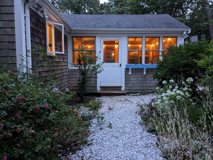 Wellfleet Cape Cod vacation rental - Screened in porch at dusk.