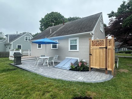 Falmouth Cape Cod vacation rental - Patio w/ dining set, grille and an outdoor shower