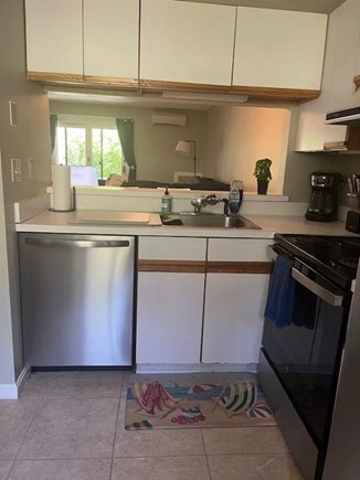 Ocean Edge Cape Cod vacation rental - Kitchen, looking into the family room. New dishwasher and stove.