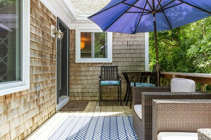 East Dennis Cape Cod vacation rental - Cozy back deck for morning coffee.