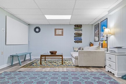 East Dennis Cape Cod vacation rental - Basement with couch and split AC