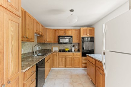 Wellfleet Cape Cod vacation rental - Well furnished kitchen just off the dining room and deck.