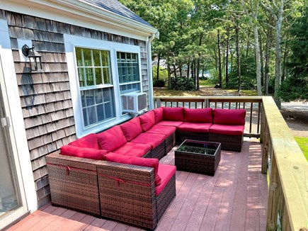 South Yarmouth  Cape Cod vacation rental - Deck with new patio furniture overlooking backyard