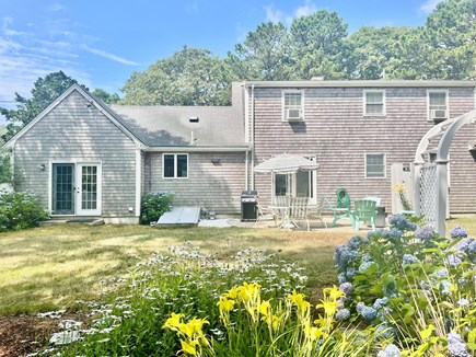 South Chatham Cape Cod vacation rental - Back of Home and fenced in yard