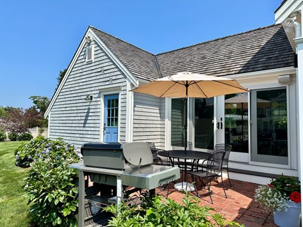 Harwich Port Cape Cod vacation rental - South Patio off sunroom with BBQ and outdoor shower