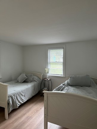 Falmouth, Teaticket Cape Cod vacation rental - Back bedroom with two twins, dresser and closet.