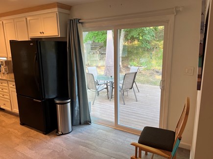 Truro Cape Cod vacation rental - Kitchen sliders to rear deck