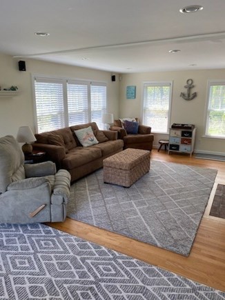 East Dennis Cape Cod vacation rental - Family room - couch, 3 chairs, Streaming TV, Fireplace.