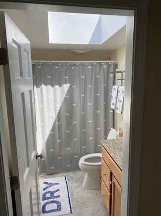 East Dennis Cape Cod vacation rental - 2nd Floor bathroom - with tub and huge skylight.