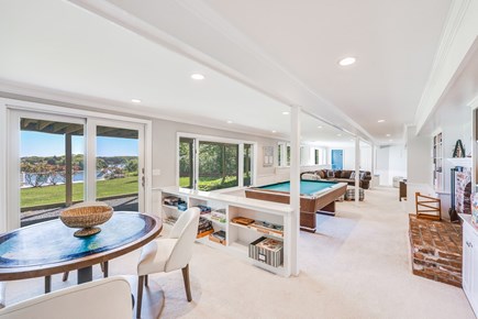 East Orleans Cape Cod vacation rental - Sprawling Entertaining Room with sliders to Backyard and Deck.